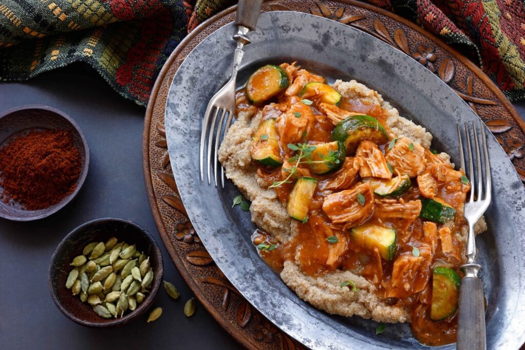 Gluten-Free Chicken Stew with Teff Polenta displayed on table with ingredients