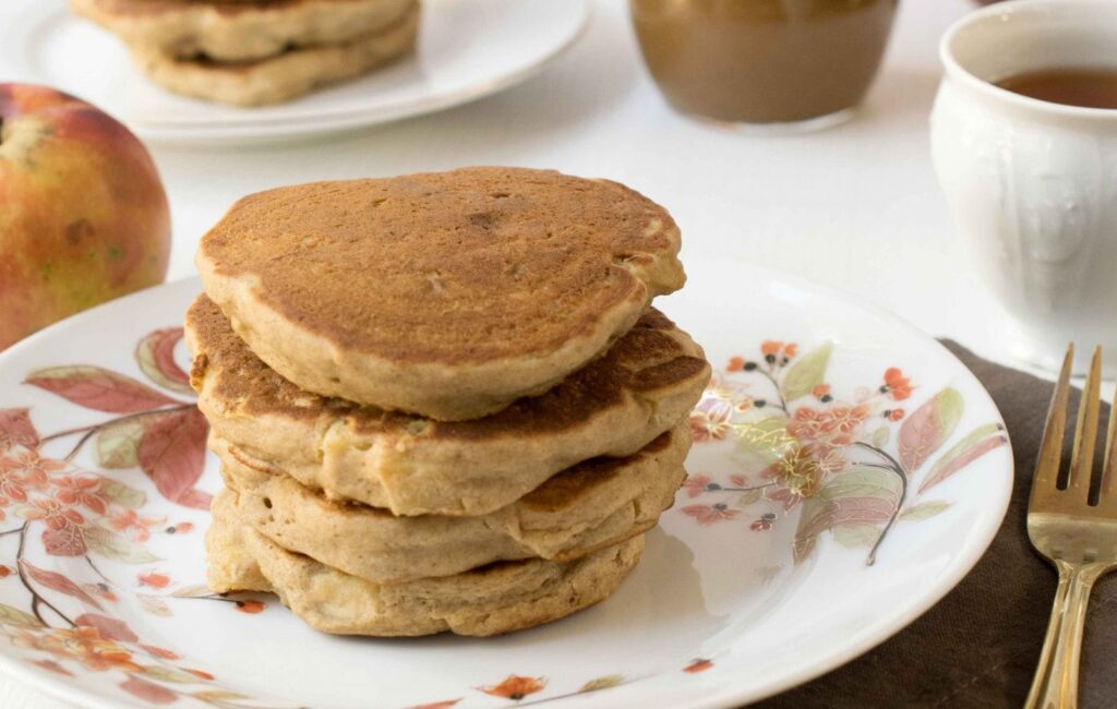 Apple Teff Pancakes stacked on plate