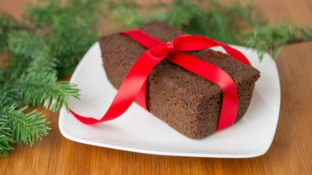 Whole Grain Teff Gingerbread wrapped in red ribbon