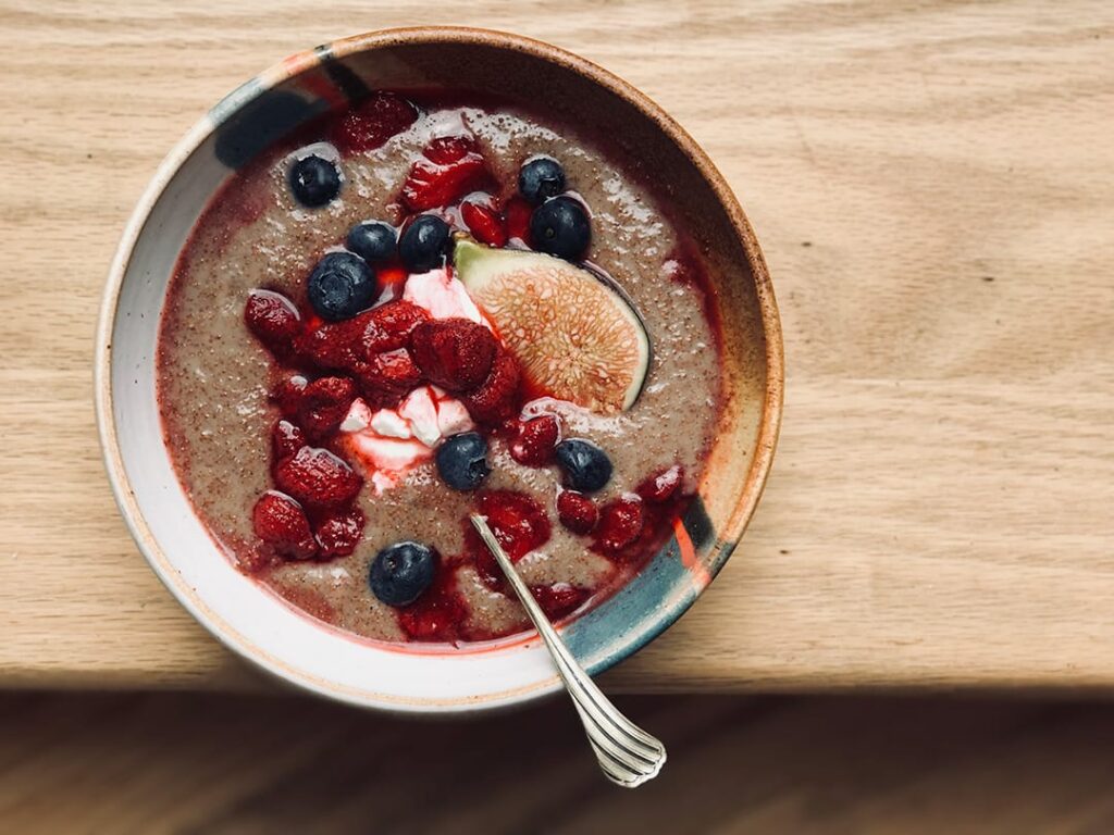 Chai Teff Porridge with berries on top