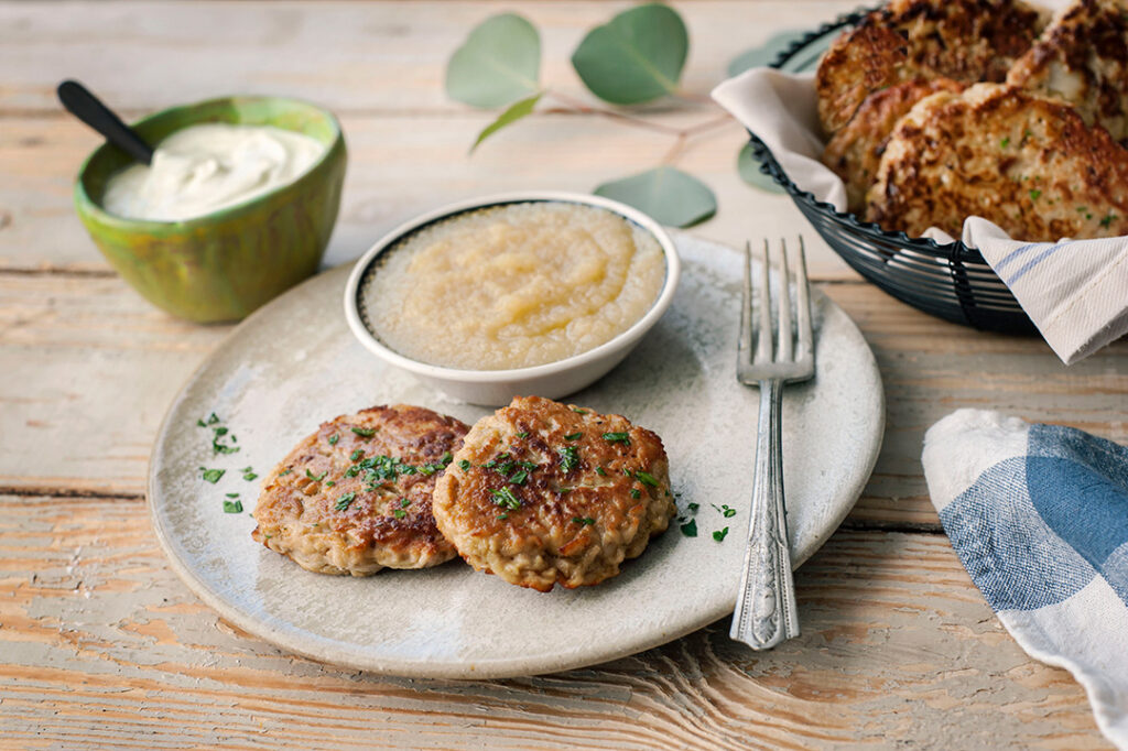 Gluten-Free Potato Pancakes on plate with applesauce