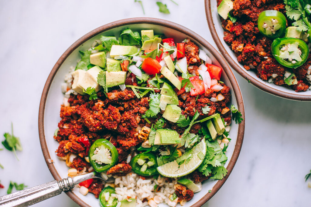 Vegan Taco Bowl with teff taco meat and colorful vegetables