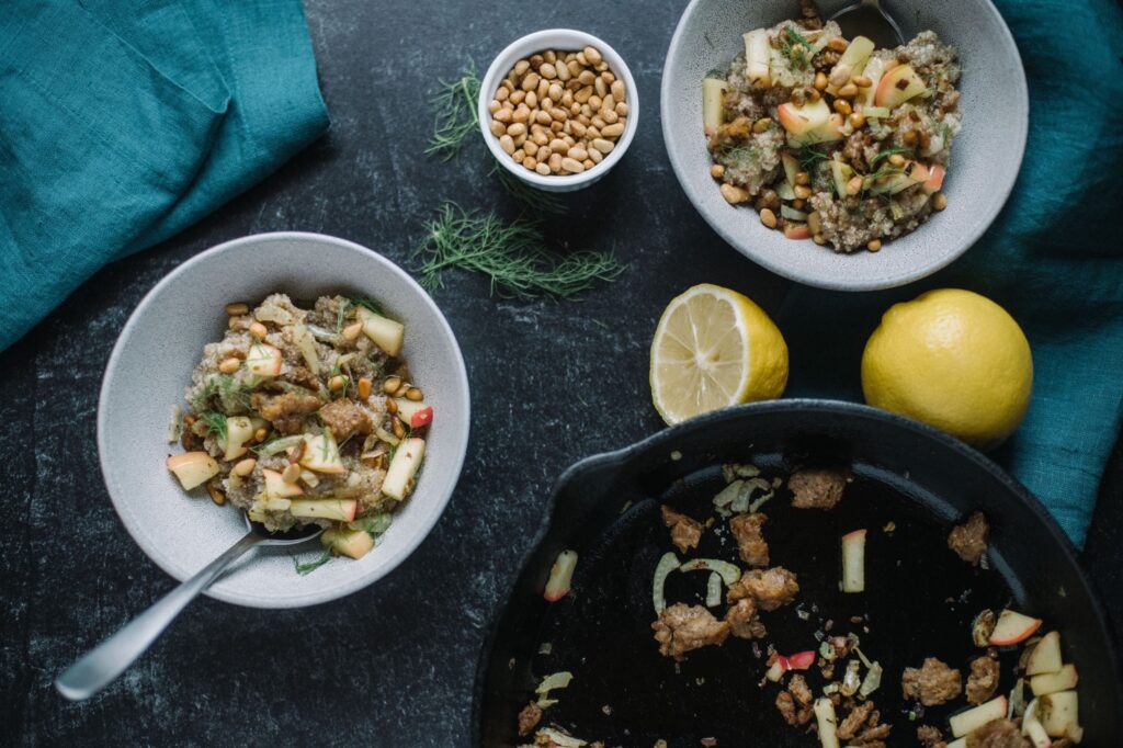 Teff Hot Cereal in bowls with lemons on table