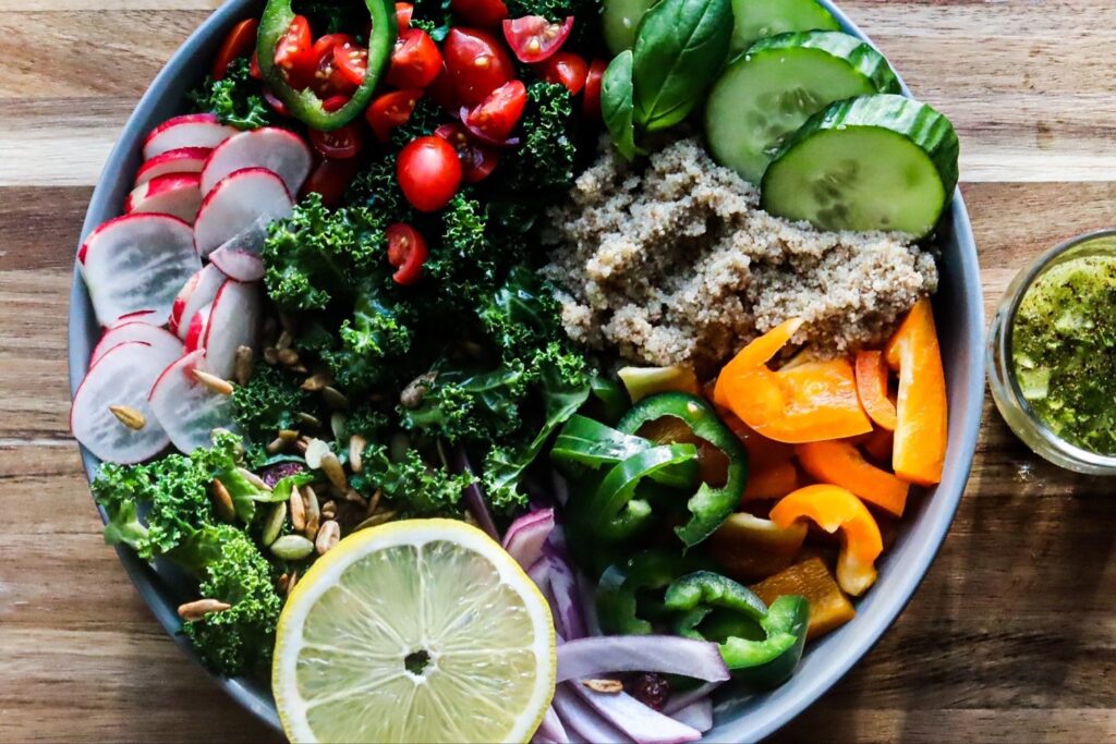 Salad filled with veggies and gluten-free teff grain