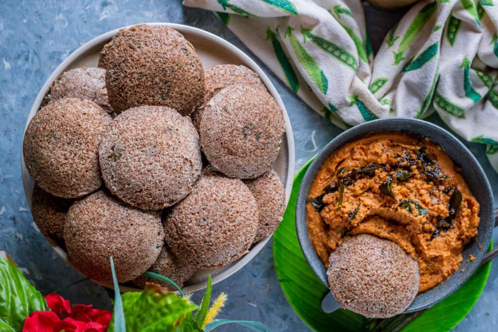 Savory Teff Cakes "Idli" shown in bowl w/ Chutney