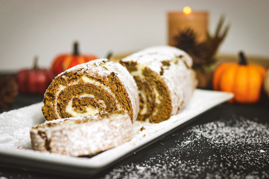 Gluten-Free Classic Pumpkin Roll sliced on dish