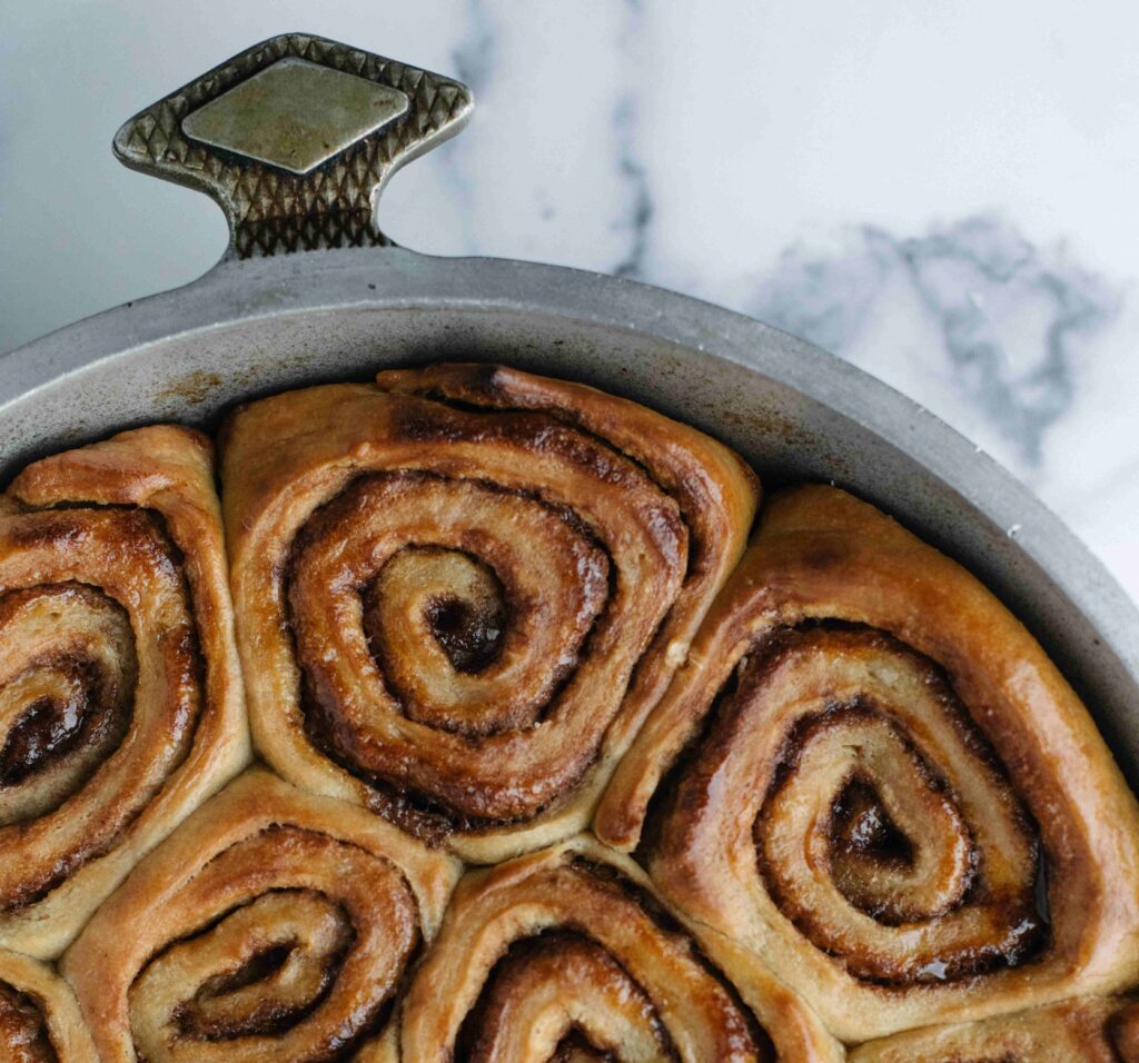 teff cinnamon rolls in pan